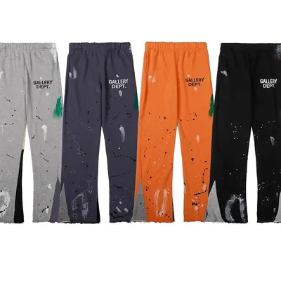 Four paint-splatter sweatpants